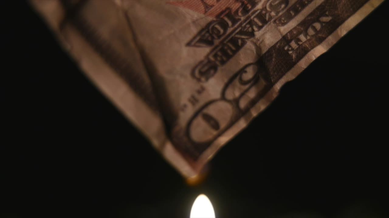 Burning five hundred dollars