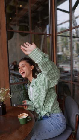 woman enjoying coffee in a cafe