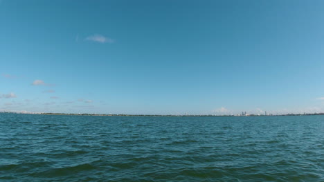 travel-by-water-on-the-ocean-on-a-sunny-day-with-blue-skies-in-Florida-POV-of-boat