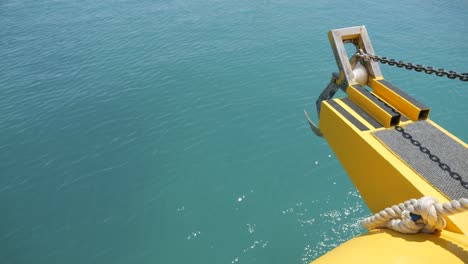 Peaceful-view-off-the-front-of-a-boat-cruising-through-sunny-clear-seas