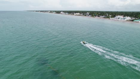 people fun on a jet ski on the beach