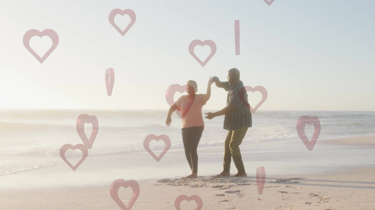 Dancing on beach, couple enjoying moment with heart animations in background