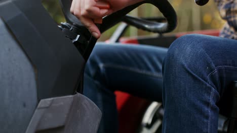 person operating a tractor