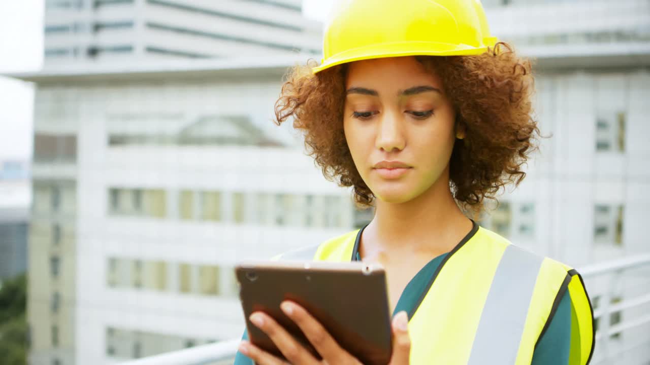 Female architect using digital tablet 4k