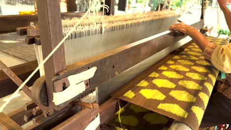 traditional thai weaving on a loom