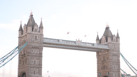 tower bridge spanning the thames river in center of city of london, united kingdom, britain