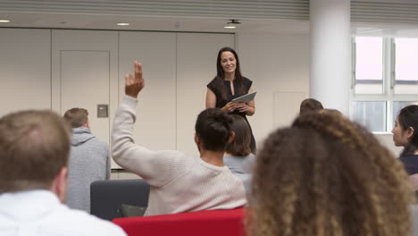 Female-teacher-takes-questions-from-university-students,-shot-on-R3D