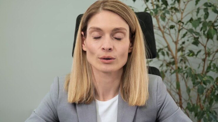 POV of caucasian entrepreneur female leader on online video call, listening to his partners, nodding agree working from office. Remote worker on computer conference communication internet web view.