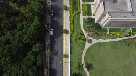 view-from-above-the-streets-of-santo-domingo,-residential-area-near-the-church-of-Jesus-Christ-of-Latter-day-Saints-and-its-beautiful-garden