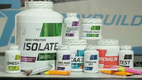 sport nutrition store interior with large choice of nutritional supplements.