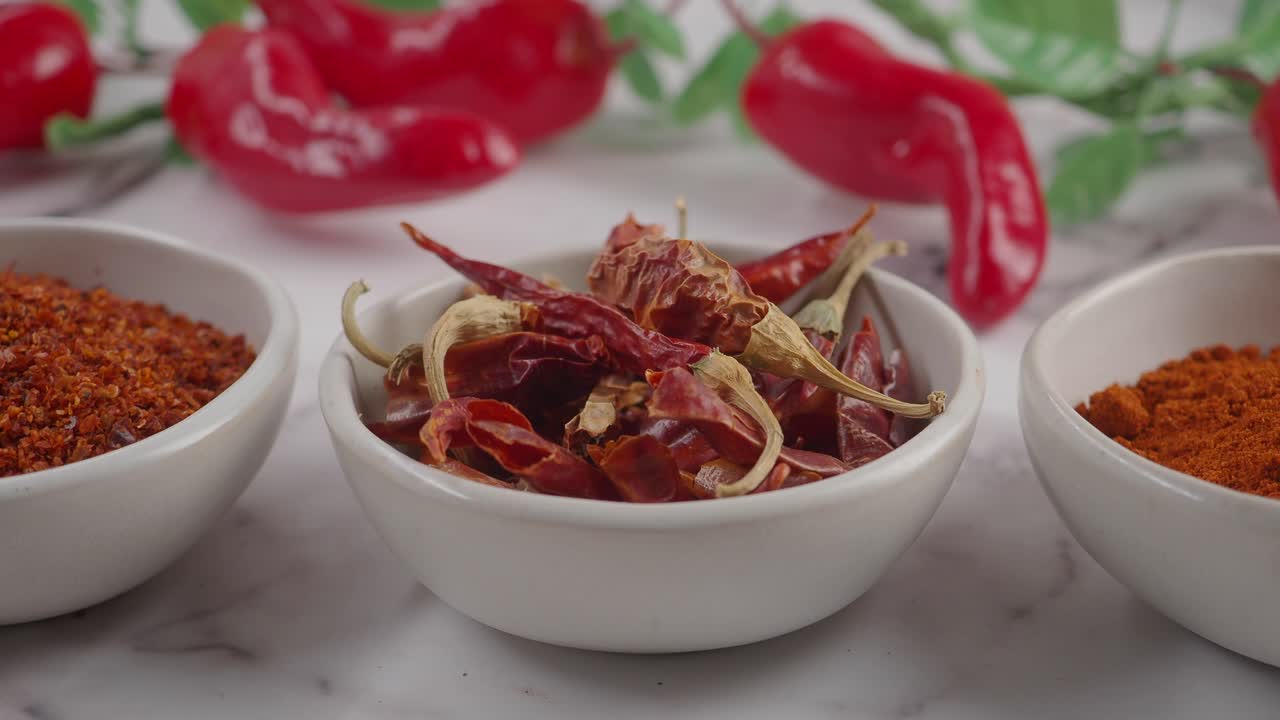Three Bowls with Different Forms of Chili Peppers