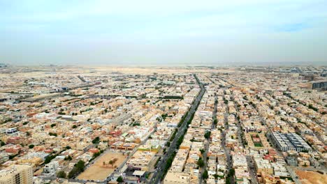 drone shot residential buildings and houses in suburb of riyadh city