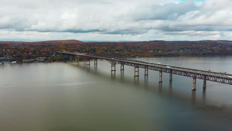 bridge in new york with fall colors in background