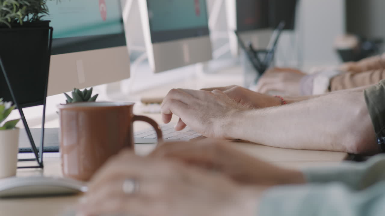 Coworkers Working at Desk