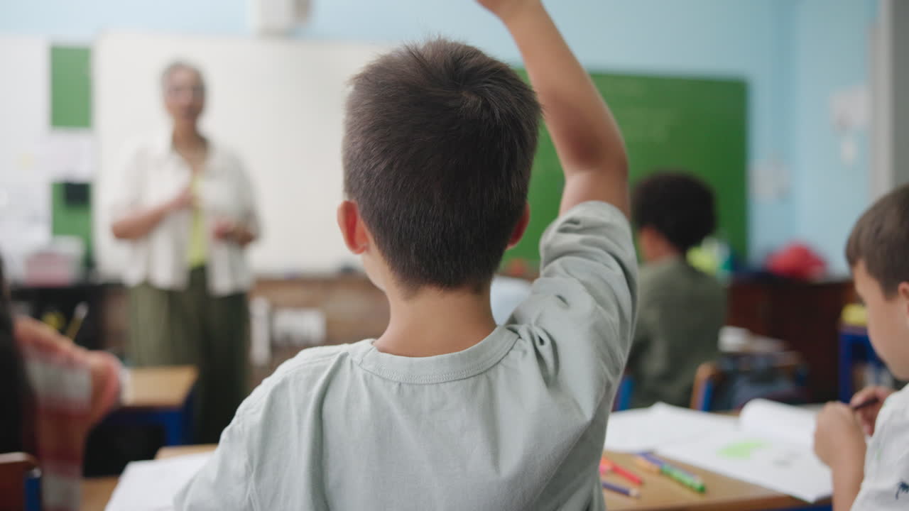 Students in a classroom setting with a teacher