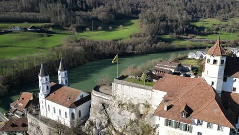 aarburg aargau switzerland static view of flag in the wind with scenic river background