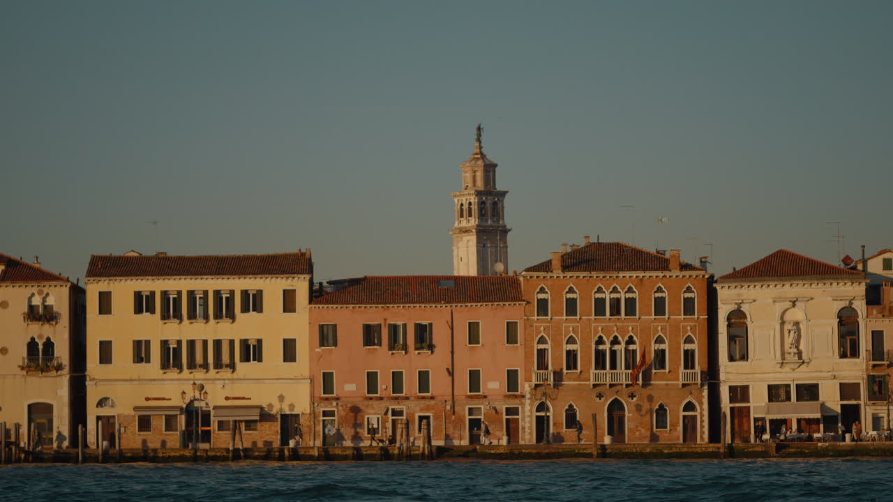 Colorful Venetian Houses Along the Canal at Sunset