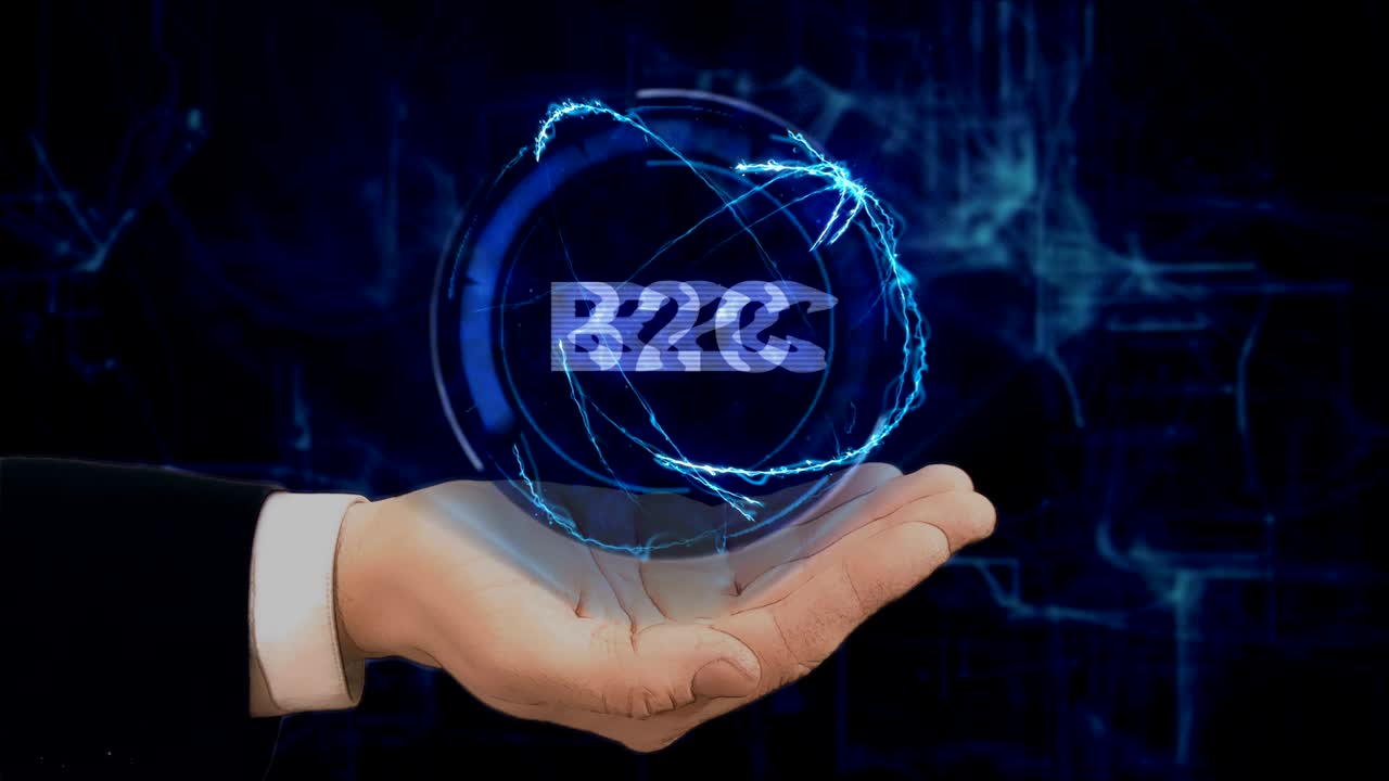 칠한 손은 그의 손에 개념 홀로그램 b2c를 보여줍니다.