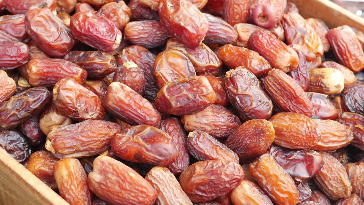 Many date fruits display for sale at local market