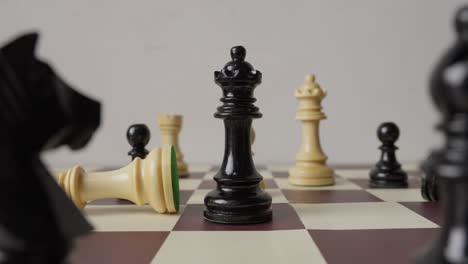 black queen moving to square occupied by the white king to take and win