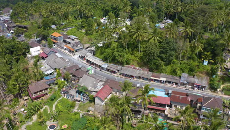 forwarding drone to capture main street in ubud next to tegalalang rice terrace in bali indonesia