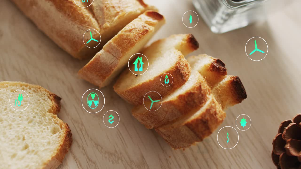 Green energy icons appearing, drifting, rotating over baguette on play, showing eco links