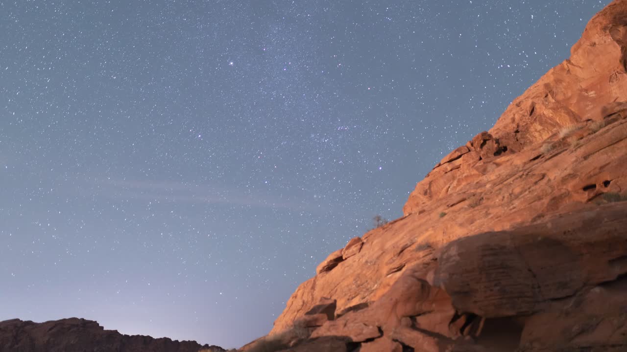 Night Timelapse of Valley of Fire State Park , with planes and shooting stars
