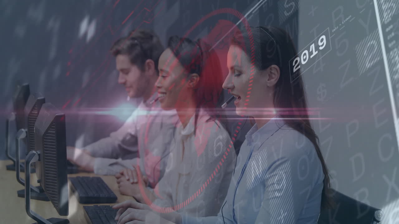 Customer service team working at computers with digital data animation overlay