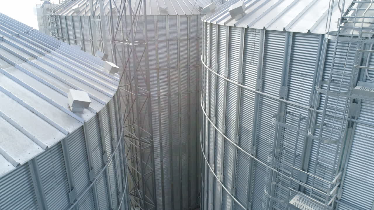 Big metal factory construction. Petrol huge metal equipment. Aerial view.