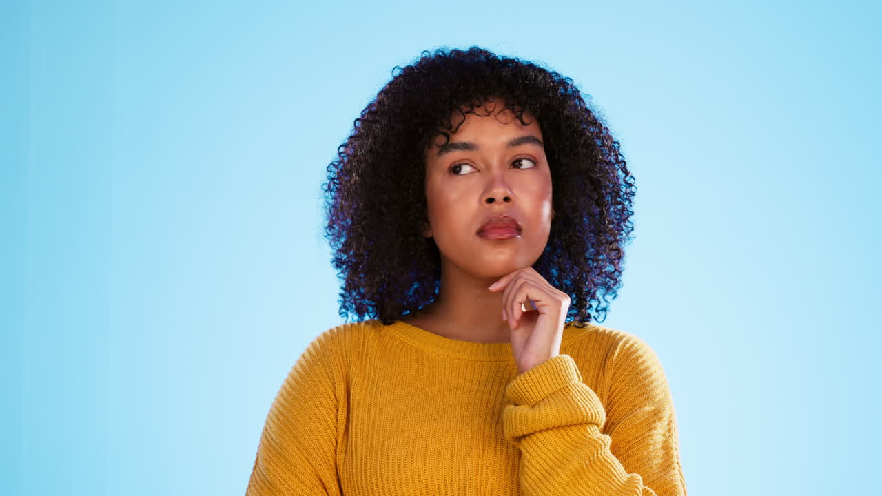 Confused, thinking and contemplating black woman