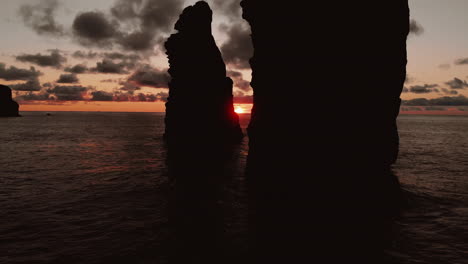 sunset through sea stacks