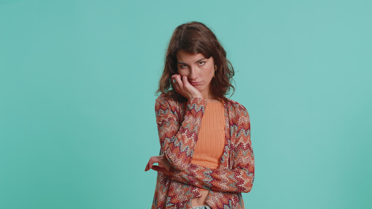 Woman tired bored expression exhausted of tedious story not interested in communication talk