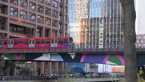 dlr in canary wharf towards greenwich, london, united kingdom