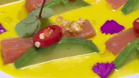 salmon and avocado soup dish