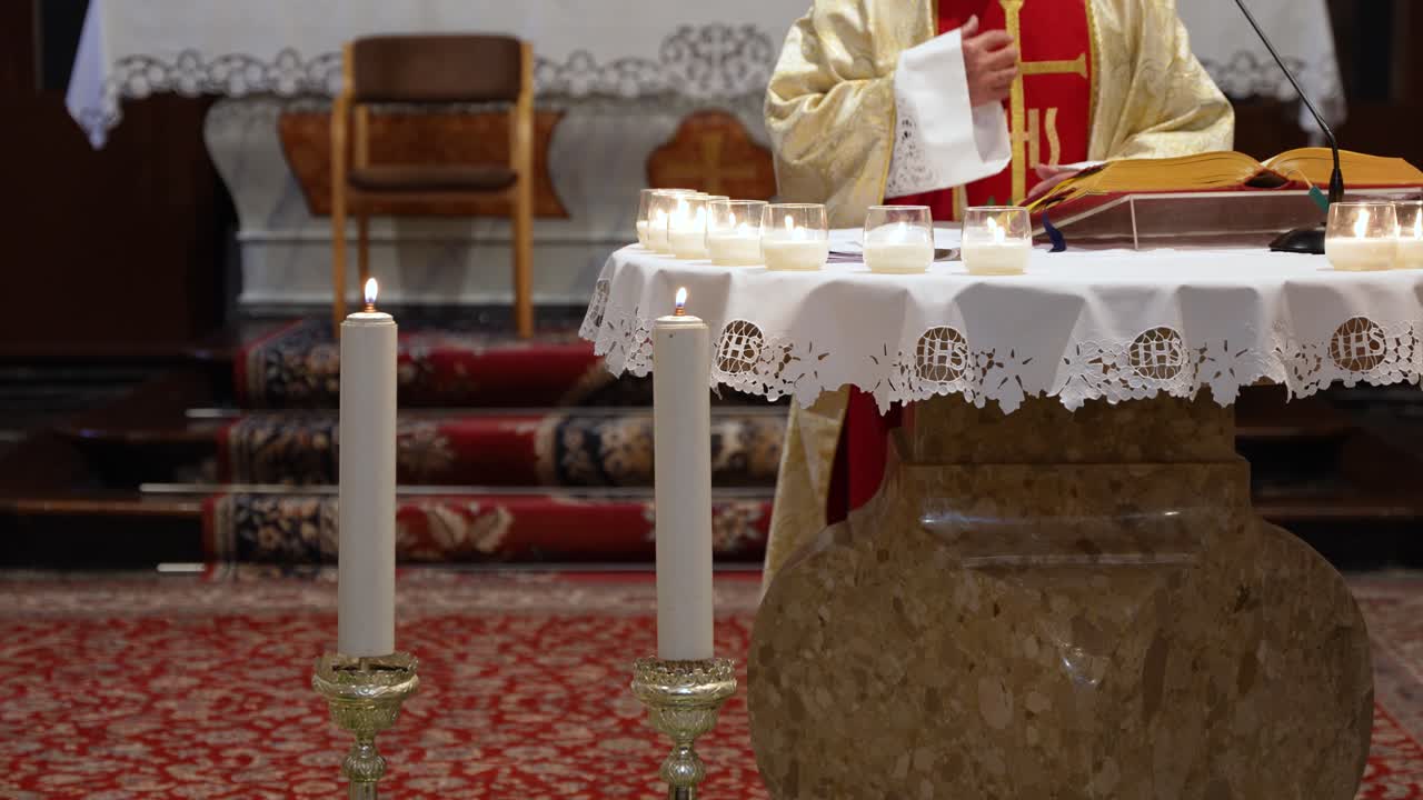 Priest On The Altar During First Communion Ceremony Mass In The Catholic Church. - wide shot