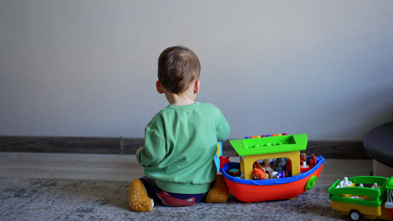 Toddler playing with toys