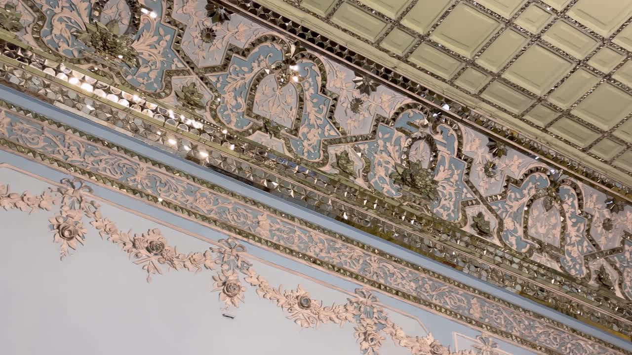 Persian mirror work and plaster molding design intricate details elegant ballroom opulent design regal space majestic castle royal elegance cultural heritage Tehran Iran luxurious decor architecture