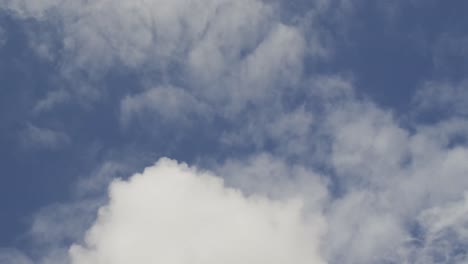 Low-angle-view-of-blue-sky-with-clouds