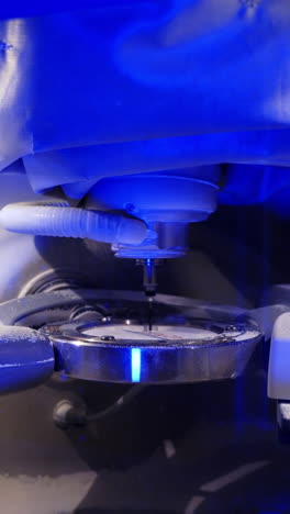 machine producing prosthesis implants. process of manufacturing dentures in the dental laboratory