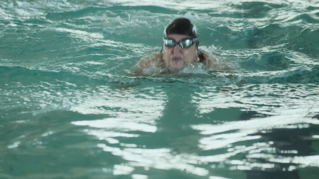 Swimmer training in a swimming pool