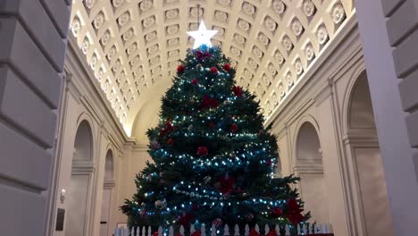 christmas tree with decoration and lights in pasadena city hall, california usa, tilt up