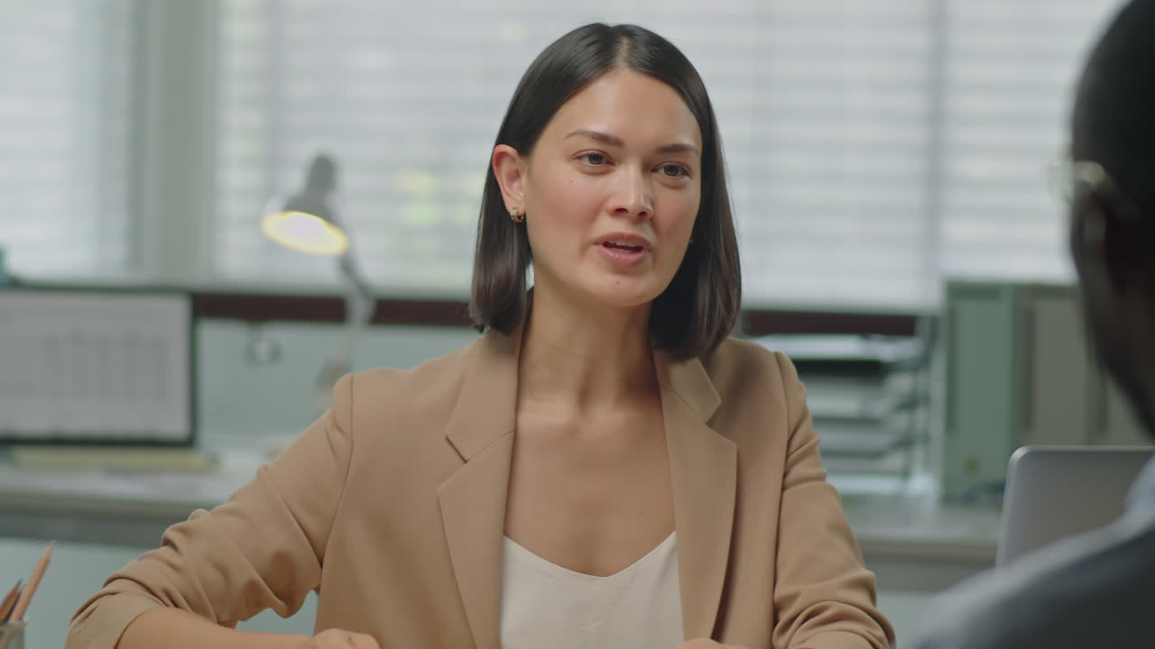 Female HR Manager Interviewing Job Candidate in Office