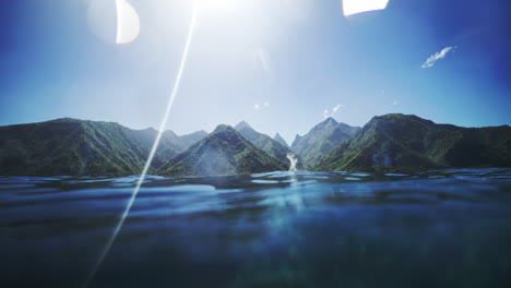 View-from-in-water-of-picturesque-French-Polynesia-Tahitian-mountains-and-turquoise-ocean