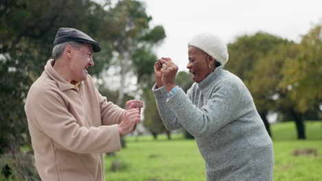 senior couple, dance and outdoor at a park