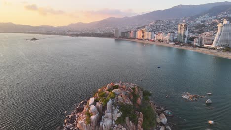 aerial shot of acapulco beach and parachute