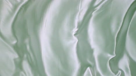 bed sheet moving in waves