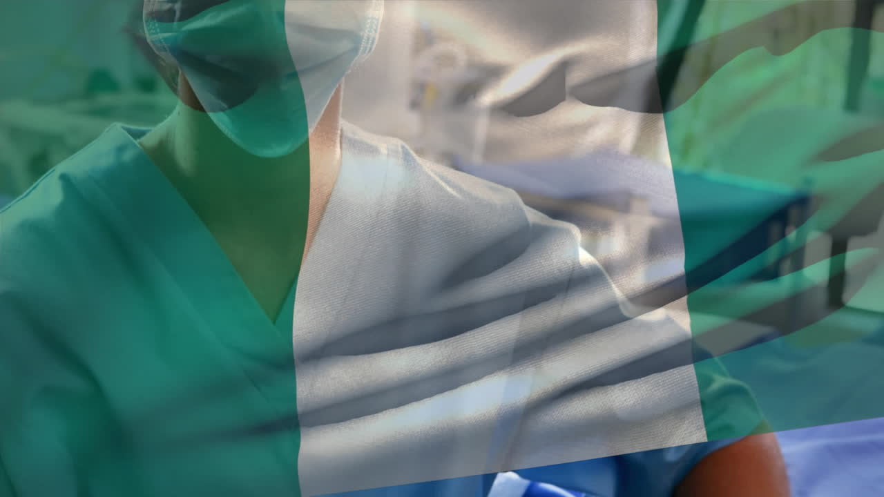 Bandiera della Nigeria che sventola sullo sfondo di un'operatrice sanitaria donna caucasica con mascherina in ospedale