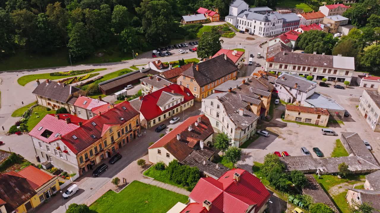 Cinematic establishing shot shows red rooftops and streets of Talsi Latvia town