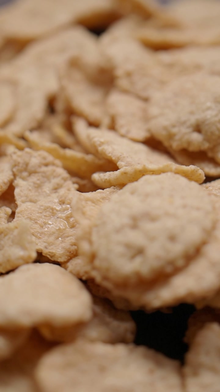 Macro Close-up of Golden Brown Breakfast Cereal Flakes
