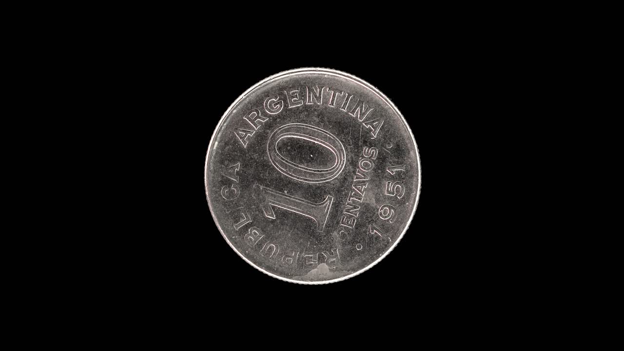 Argentina 1951 10 centavos coin obverse with large denomination rotating on black background
